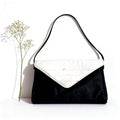 Vintage 70's white and black leather envelope clutch bag
