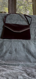burgundy leather shoulder bag with a  silver accent Caressa Made In Spain