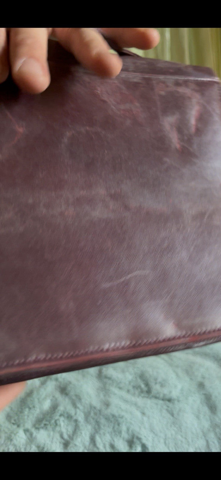 burgundy leather shoulder bag with a  silver accent Caressa Made In Spain
