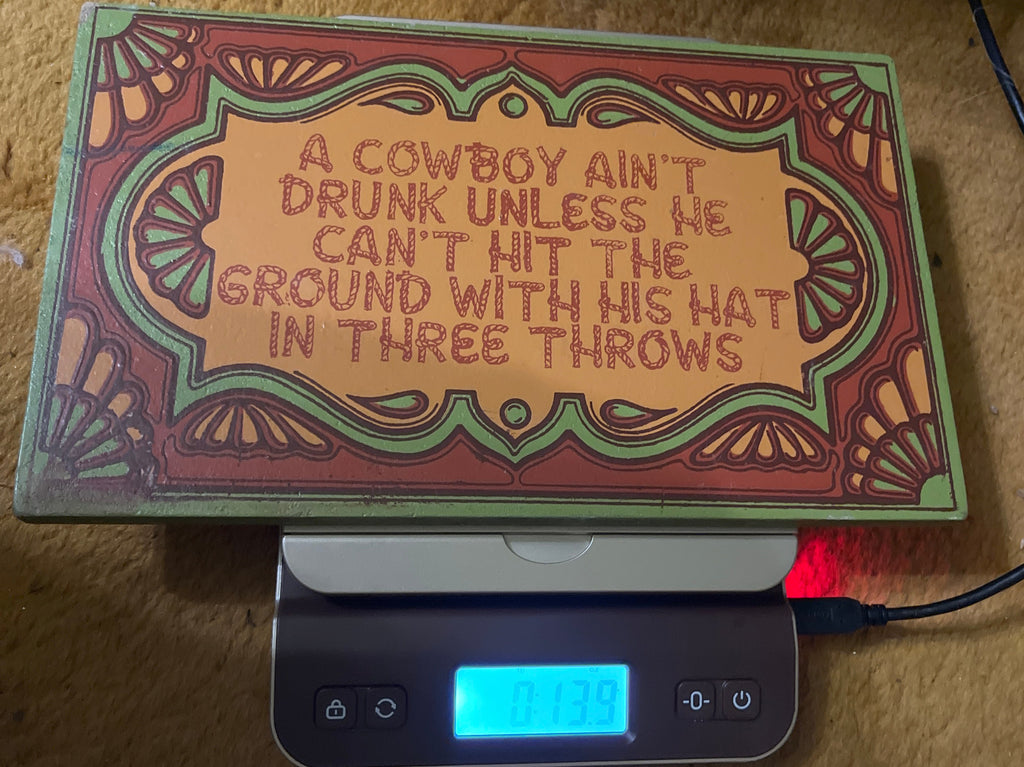 A cowboy ain’t drunk unless he can’t hit the ground with his hat sign pf