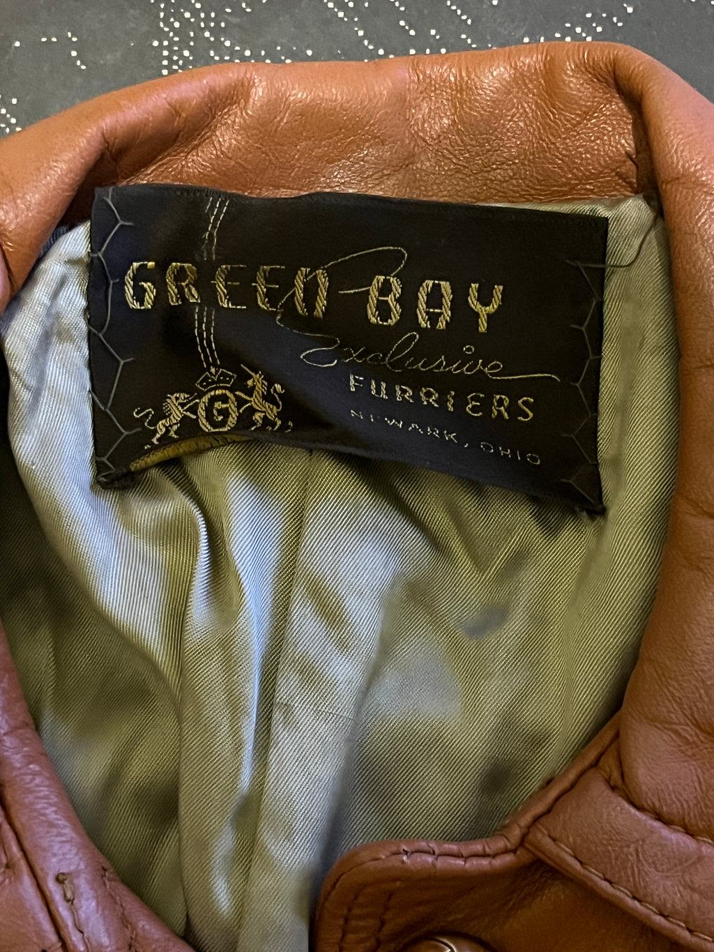 Vintage 1960s/70s Leather Coat by Green Bay Exclusive Furriers
Size 8 | Belted Waist | Wood Buttons zz