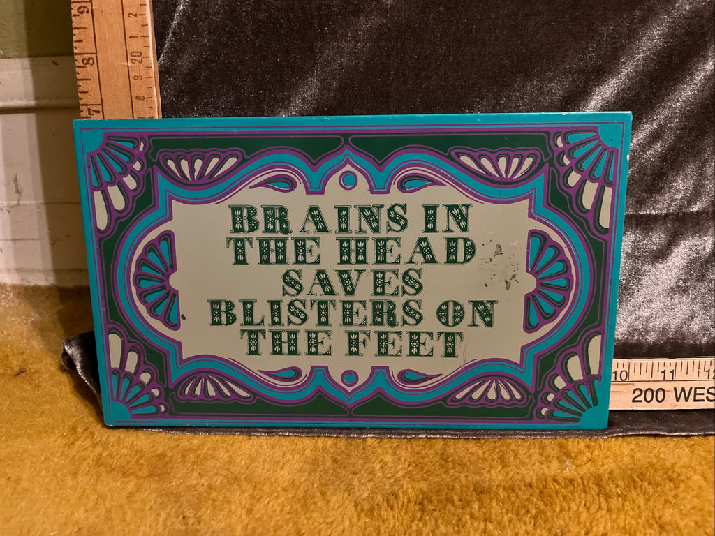 Brains in the head saves blisters on the feet sign pf