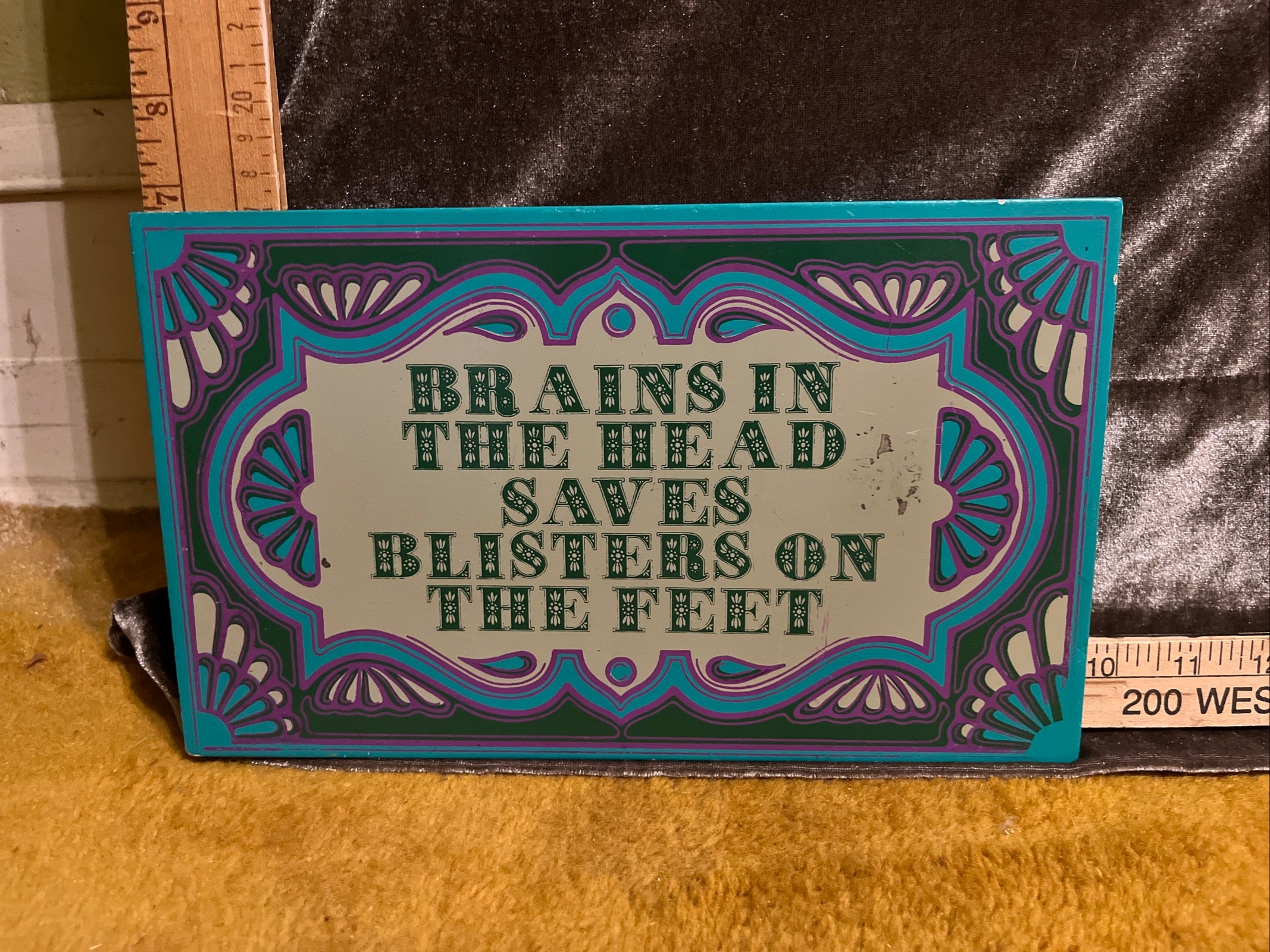 Brains in the head saves blisters on the feet sign pf