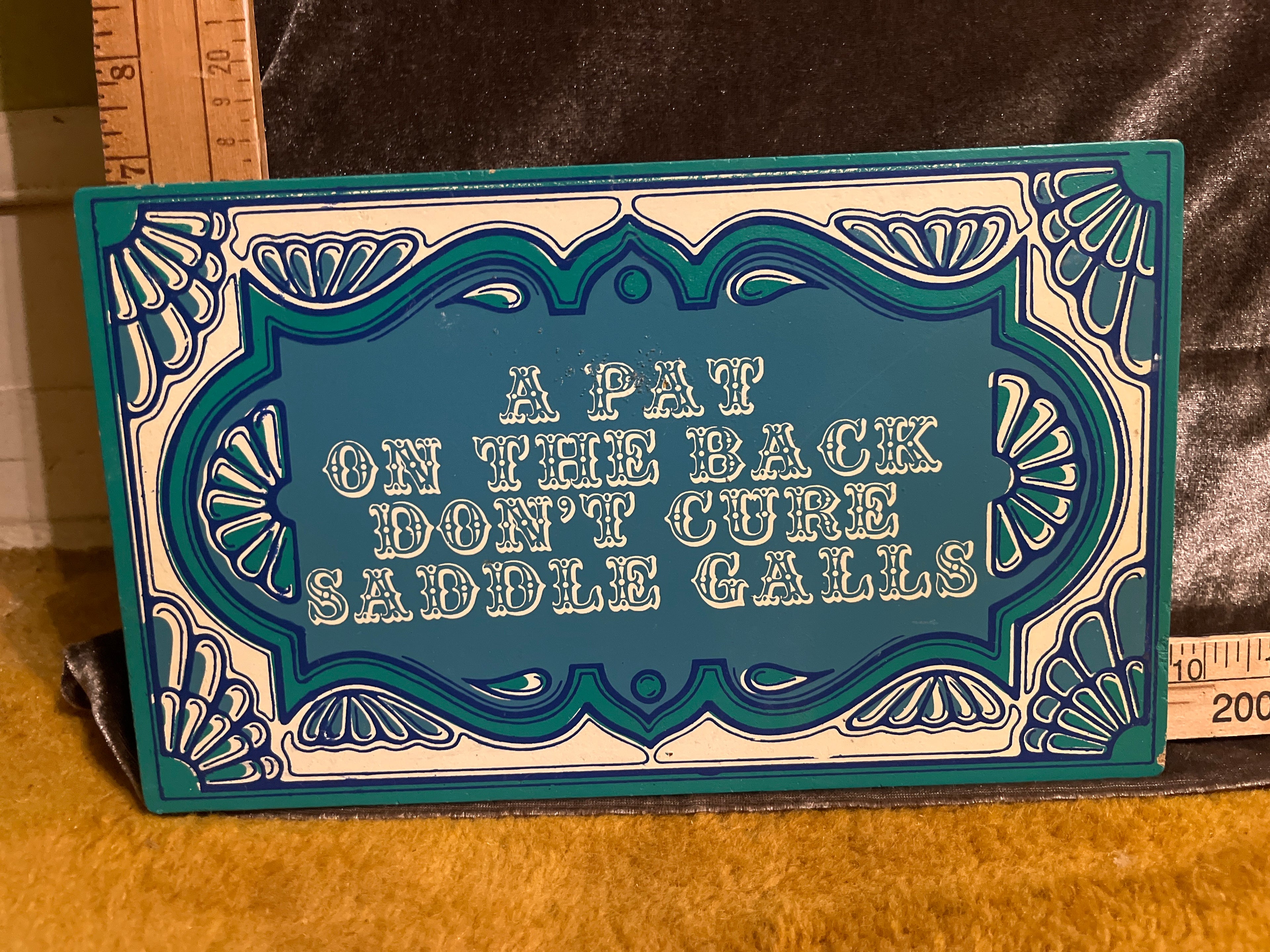 A pat on the back don’t cure saddle calls sign pf